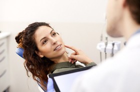 patient speaking to dentist