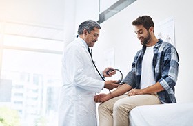 Man attending checkup with his primary care physician