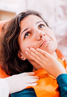 Woman at the dentist with a toothache